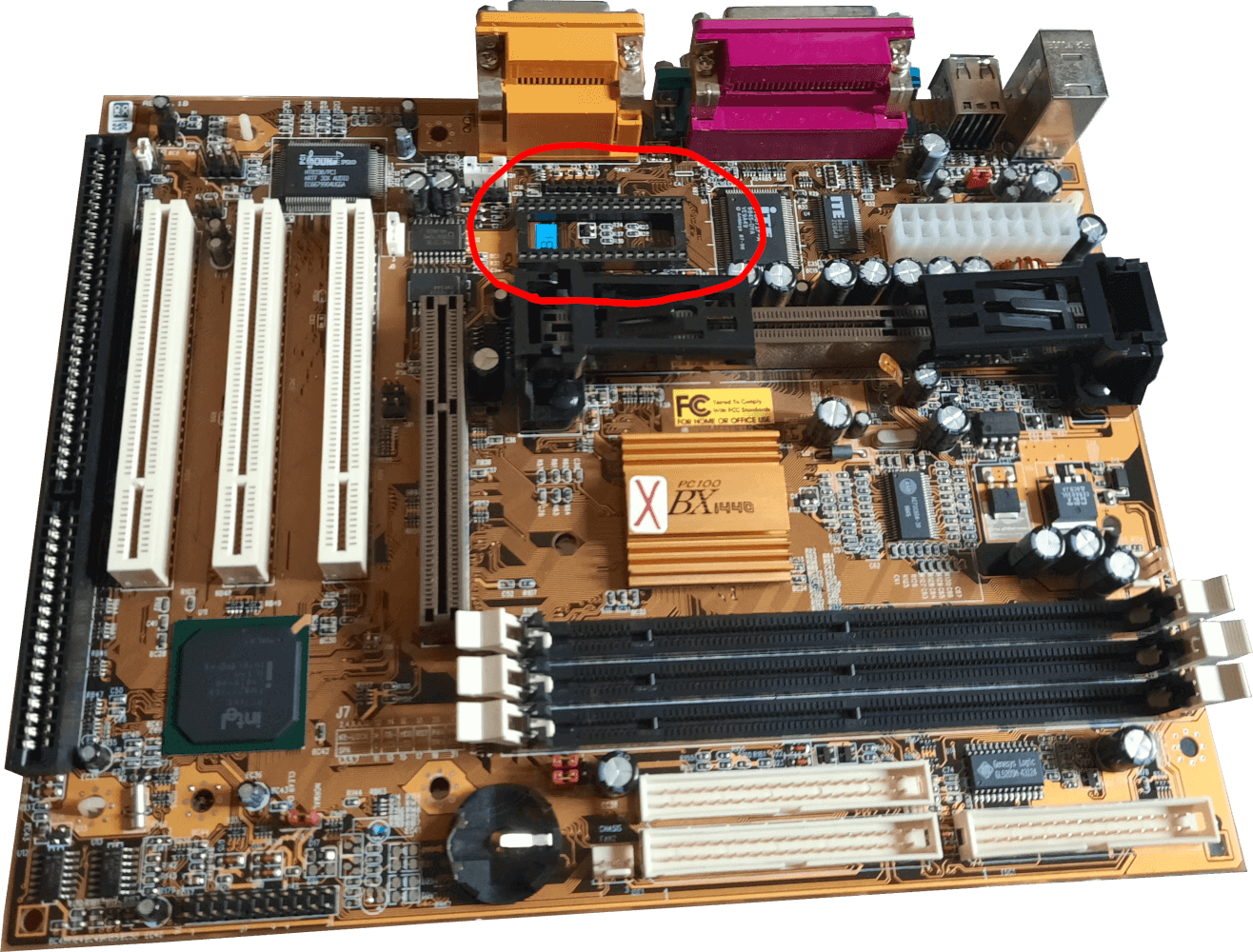 A picture of the motherboard with an empty socket circled in red.