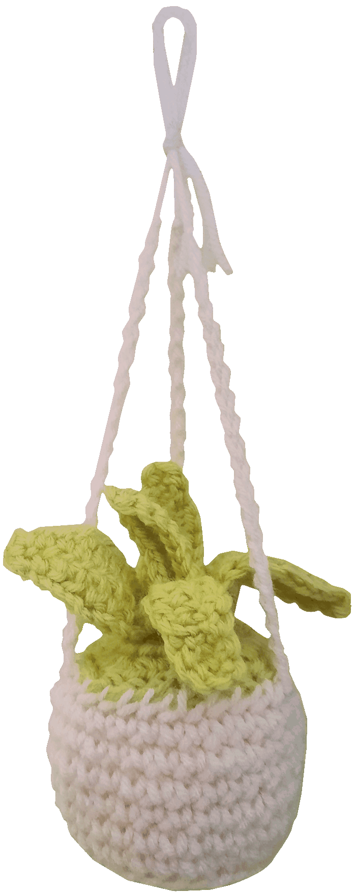 A crocheted leafy green plant in a cream-coloured hanging basket.